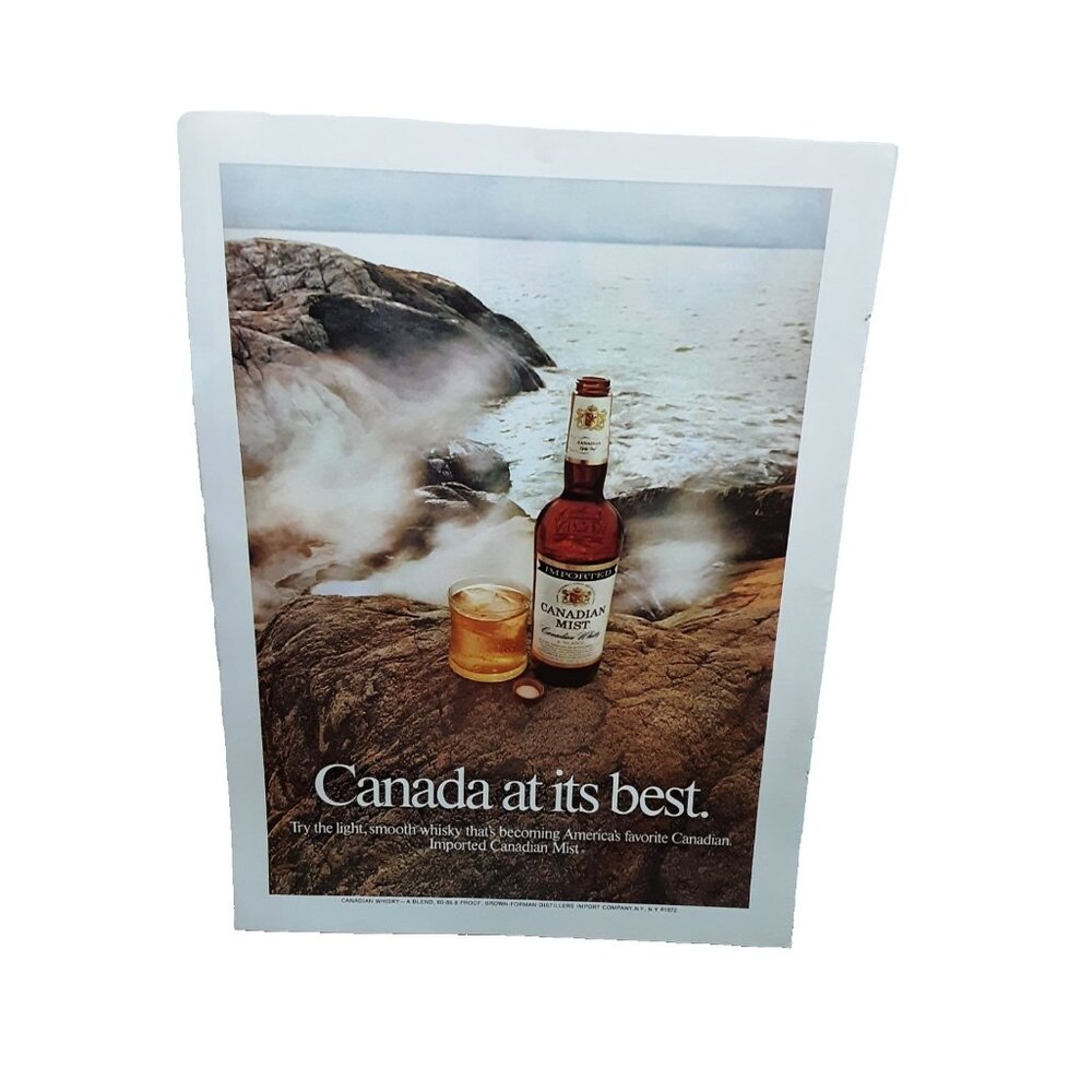 1973 Vintage Canadian Mist Ad – Whiskey Bottle on Rocks by Sea Photo